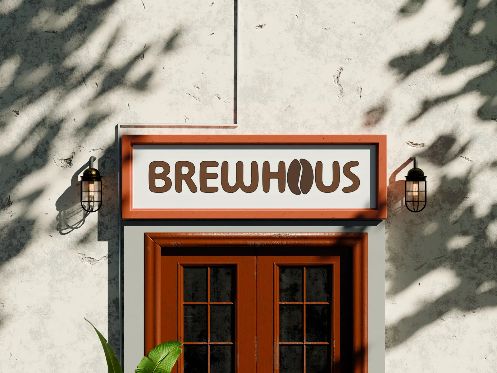 Storefront sign reading BREWHAUS above a pair of wooden doors, with wall lamps on either side and leaf shadows on the wall